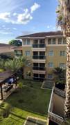 Condomínio com piscina e jardim, apart-hotel The Sun, beira do Lago